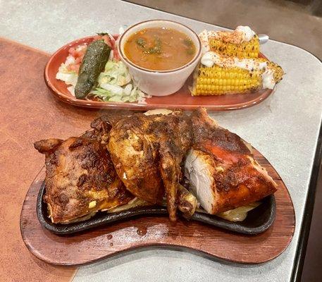 Pollo asado with grilled corn, charro beans, and grilled jalapeño
