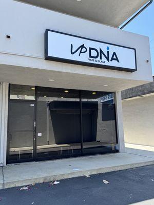 New sign, same location, same staff