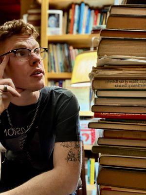 Stack of books in a reading corner.