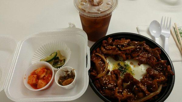 Spicy bulgogi, sides, and iced Americano makes for an satisfying lunch