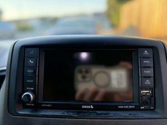 Actual unit and photo of unit from car user's manual