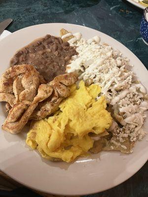 Build Your own Chilaqiiles with suiza (mild green) salsa, grilled chicken, and beans.