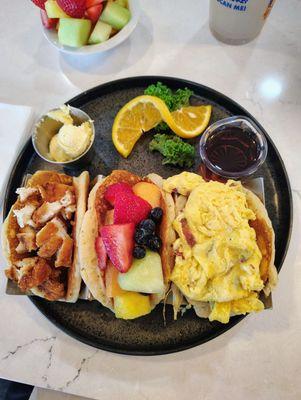 Pancake street tacos with chicken, fruit and eggs. I had more fruit as a side with it.  Various filling options available.
