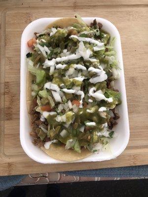 Huarache de Asada (hand made tortilla beans meat of your choice ) add any toppings