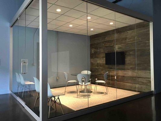 Dramatic, glass enclosed conference room for 4-8 people