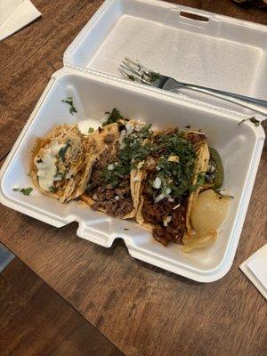 Chicken, steak, and pork tacos. Delicious!