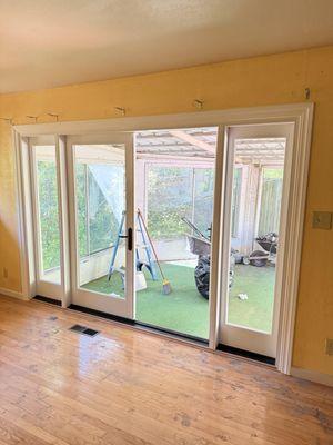 INTERIOR - MILGARD C650 ULTRA OUTSWING TWO PANEL DOOR W/ TWO SIDELITES