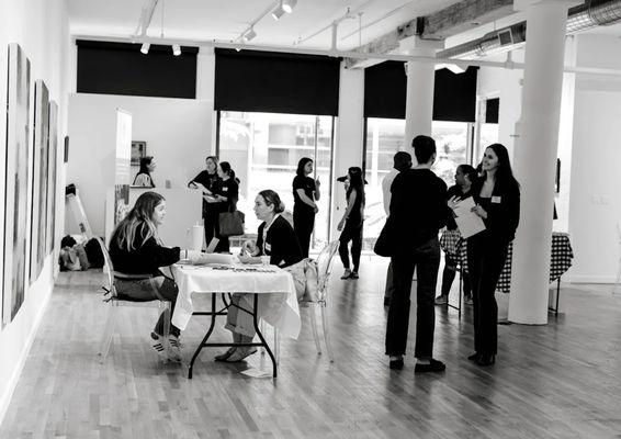 BAHS team members and guests interacting during a Meet and Greet in NYC.