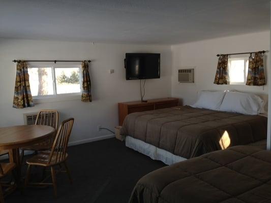 Room 8. has a king bed, double bed and an addition room with bunks.