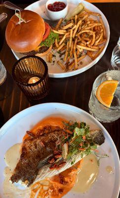 Burger & fries and branzino filet with quick escape cocktails. We also had the brussels sprouts on the side.