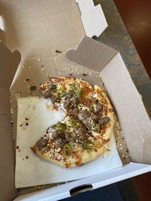 This is a personal pan pizza..... called the Bambini pizza. I personally got mine with beef and jalapeño peppers.