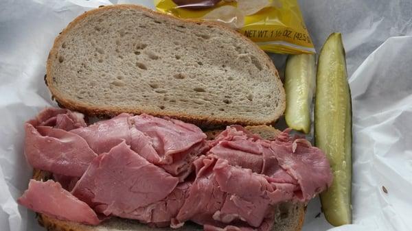 Cornbeef on rye with pickles and mustard. Not bad