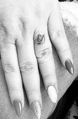 Fine line tattoo by Dallas