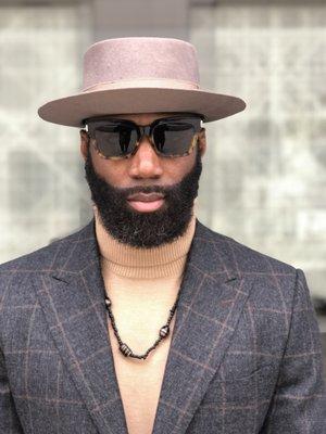 Malcolm Jenkins (owner of Damari Savile) in his custom suit and turtle neck.