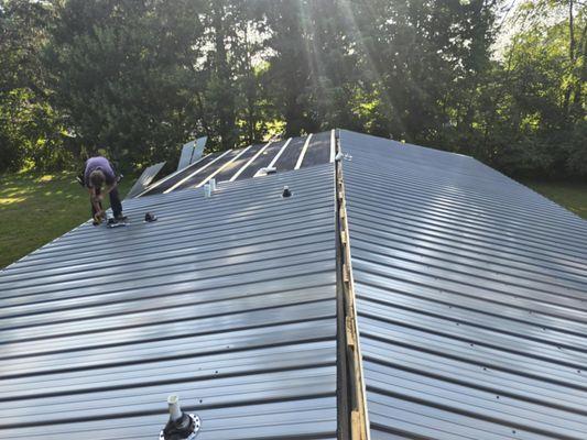 Troyers Seamless Gutters & Metal Roofing