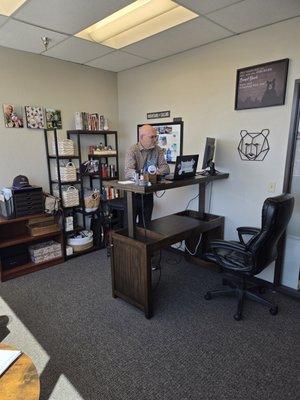 Managing Broker Ron Almberg at his desk.
