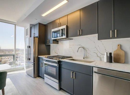 A modern kitchen inside 3THIRTY3 Apartments in New Rochelle, NY.