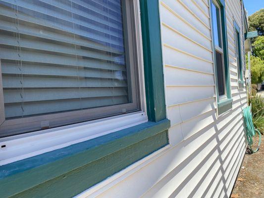 New caulking from Dale's Glass. Mariano put bigger bead & also slanted so water would drain off. Awesome job!! Thank you- Ron & Diana Riley