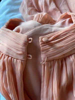 Glad it came with an extra button though.