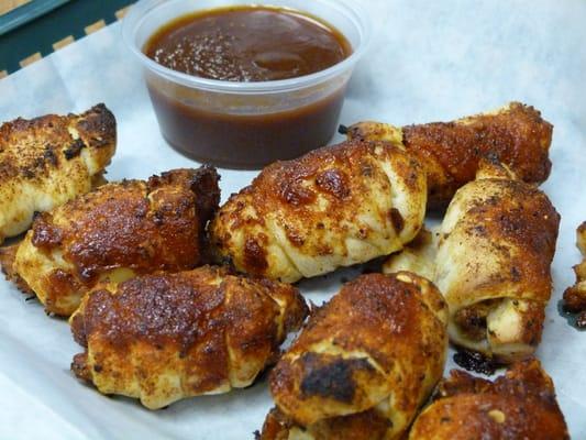 BBQ bites. Barbecued brisket wrapped in pizza dough and baked until golden.