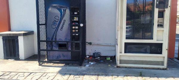 Nothing in vending machines, sink doesn't work, trash everywhere