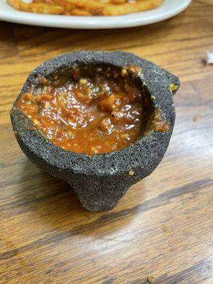 Housemade hot sauce that can be ordered on the side. Guaranteed to level up your entree.