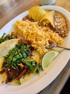 Classic taco plate with asada and al pastor no onions or pico de gallo. Really enjoyed the tacos with the green salsa from the salsa bar!