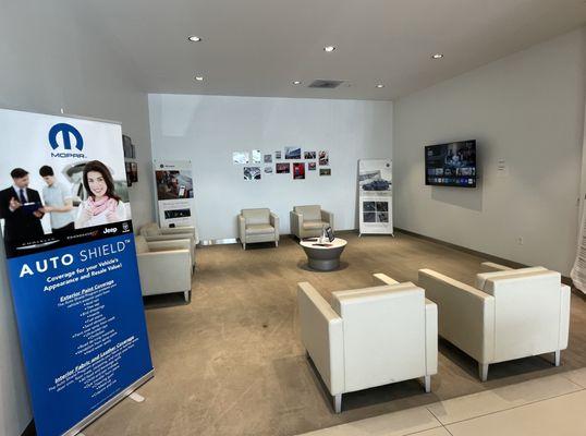 Customer lounge area. Coffee station and bottled water available.
