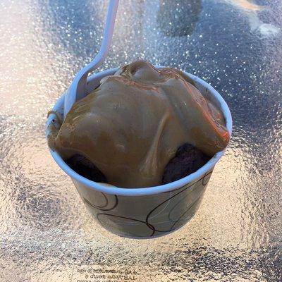 2 scoops Michigan Pothole ice cream for $2 plus peanut butter sauce added on top for 50 cents. Delicious!