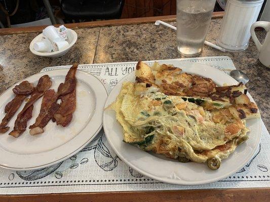 Greek omelette. Home fries. Side of bacon.