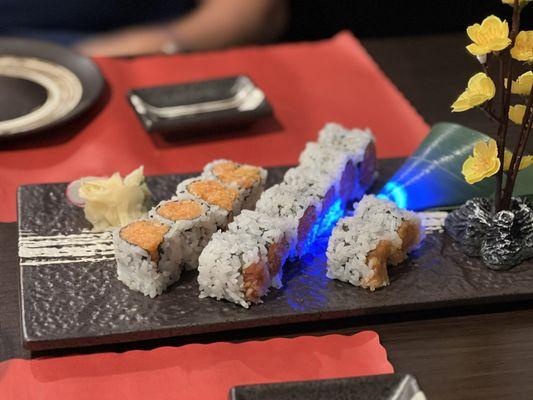 Spicy tuna and spicy salmon rolls. With cute lights and flowers!