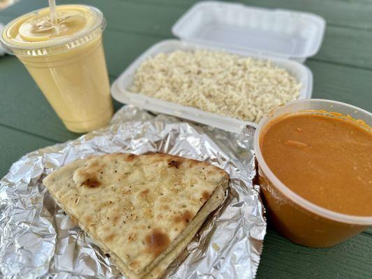 Butter chicken (mild) with garlic naan bread and mango lassi drink for dinner! 6/14/25