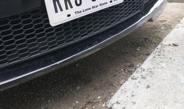 Some scrapes after the tow truck driver unloaded my car.