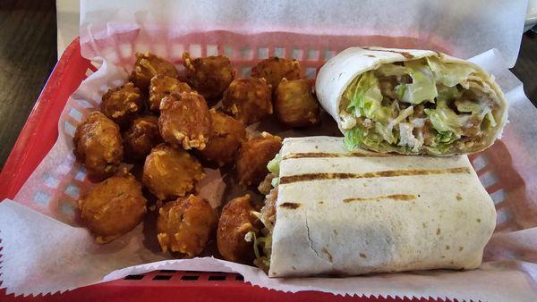 Chicken Caesar wrap with sour cream cheddar cheese tater tots