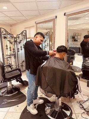 This hair guy does a + job.