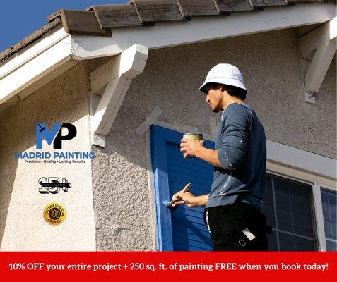 Professional South Tampa house painter from Madrid Painting applying exterior paint on a residential home. Offering 10% off entire project.