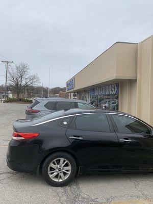 The parking lot is quite full, but there is more parking around back. The front of the store photo.