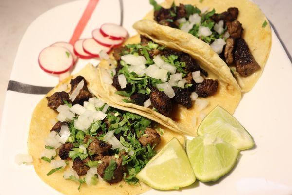 Steak Tacoz- 3 per order, all tacos served with cilantro/onion and choice of salsa verde/roja. All tortillas are made fresh daily.