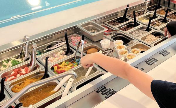 Most of the toppings. There are more out of frame plus all the sauces you can't see!