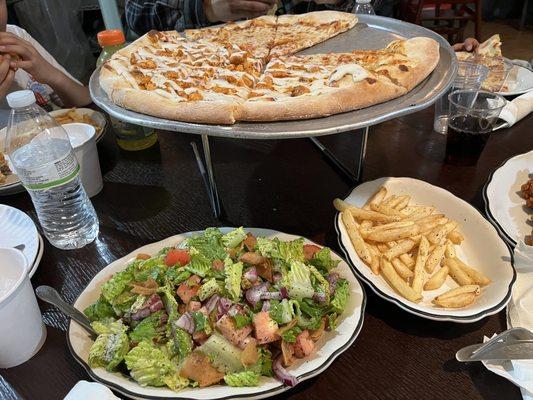 pizza, tabouli salad, wings