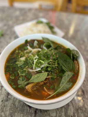 Beef stew with yellow egg noodles