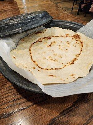 Flower tortillas nice on one side. Little crispy bird on the other.