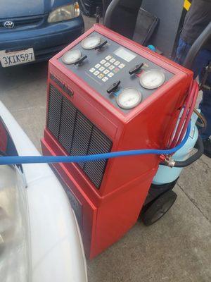 AC Machine to check for leaks.
