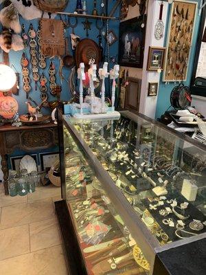 Jewelry & knives (The gold jewelry is up front at checkout.)