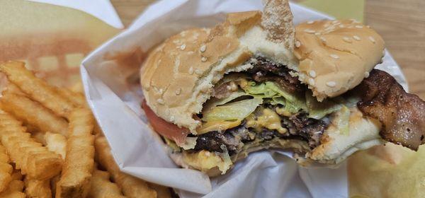 Single cheese w/ bacon (missing a bite)!