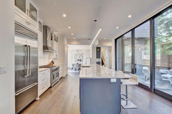 This Zilker neighborhood new construction on Goodrich will always have one of my favorite kitchens with al fresco dining just off of it.