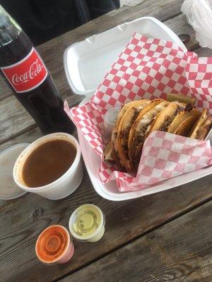 Claim to be the best Birria tacos in Tulsa!!! 5 tacos , consume and a Mexican Coke, $17.62.