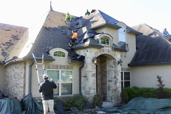 Putting a new roof on a customer who recently was impacted by a tornado in Owasso.