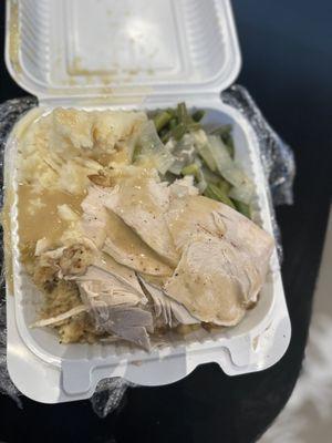 Turkey dinner Sliced turkey,stuffing,mashed potatoes and green beans