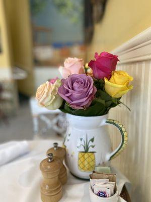 Beautiful fresh roses on every table!